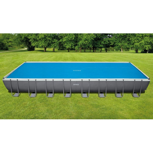 Couverture de piscine thermique rectangulaire Intex 29030 pour piscine 960x466 cm 160 microns 150 gr / m2 avec sac de transport